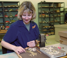 A Mepps Employee Assembles Mepps In-Line Spinners